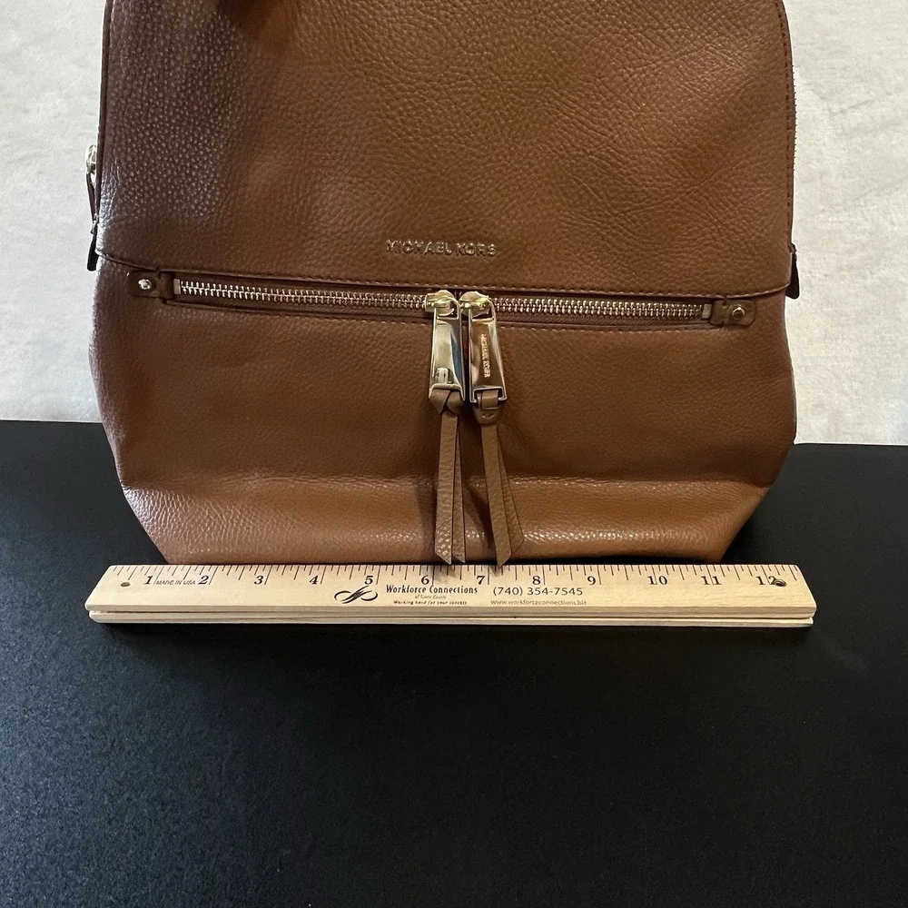 Michael Kors Pebbled LEATHER Rhea Zip Slim Backpack Purse Camel Gold Hardware
